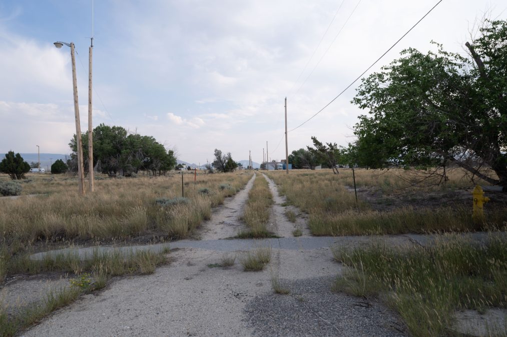 Nature reclaiming the streets of Jeffrey City Wyoming