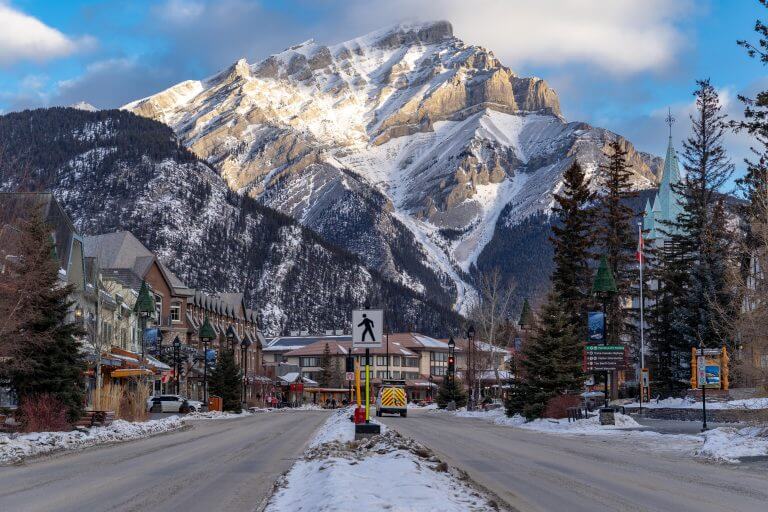 View of downtown Banff National Park, a Unesco World Heritage Site, during the winter. Cascade Mountain in background